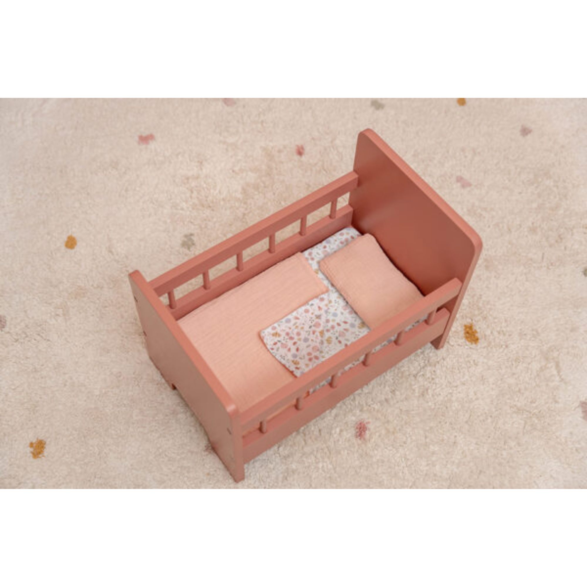 Doll bed with bedding