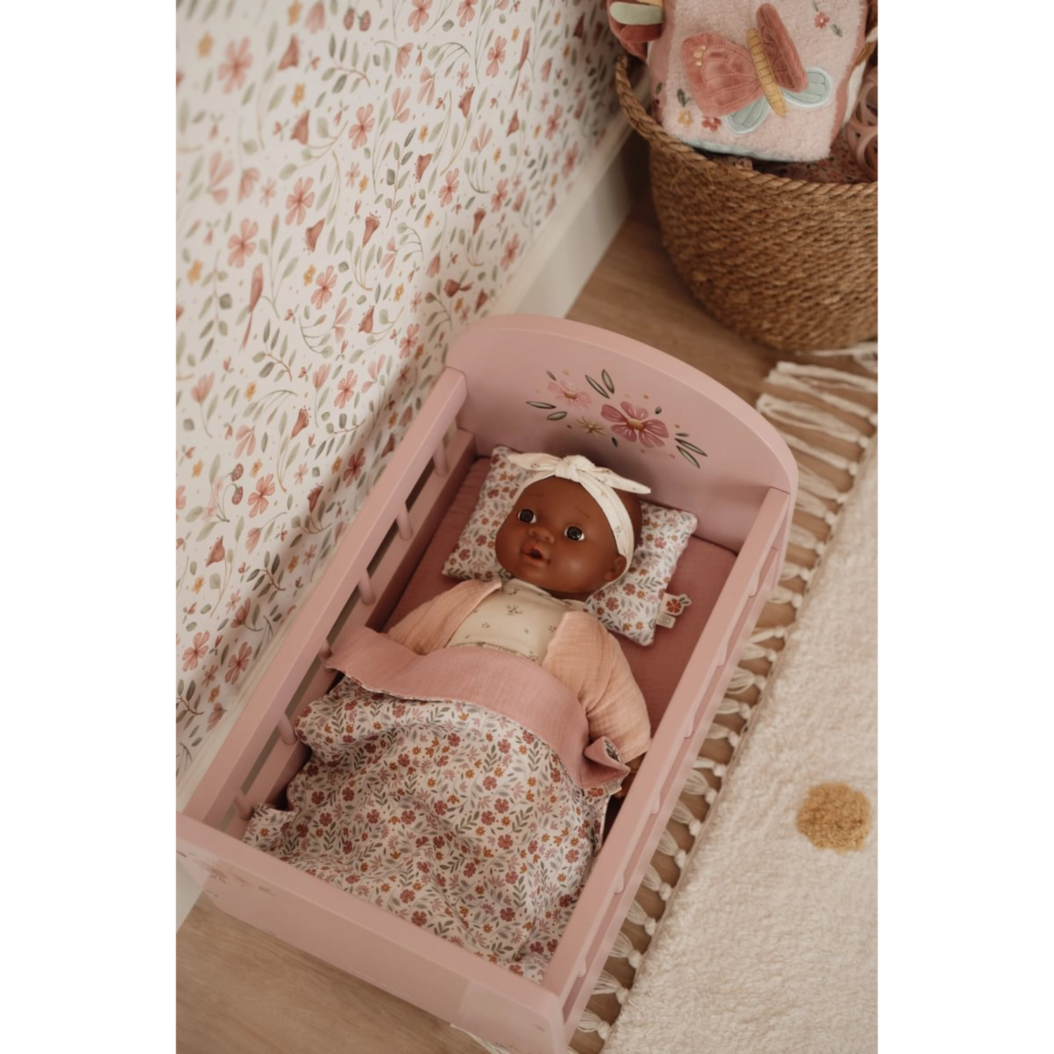 Doll bed with bedding